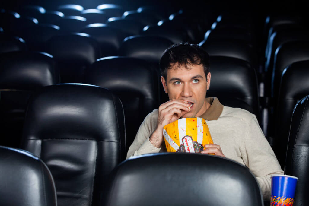 Man in Movie Theater Alone