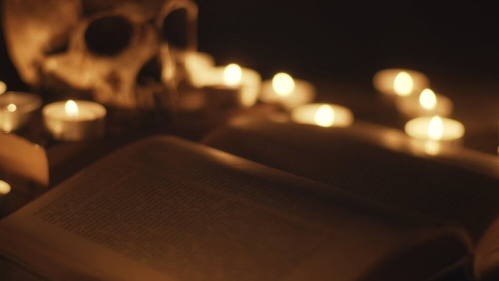 Cult book and skull