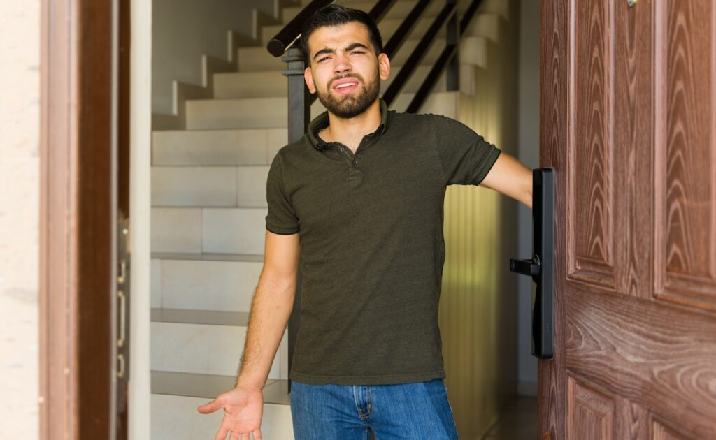 Man disgusted opening front door